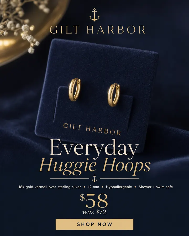 AI output for the first prompt: two slim gold hoops standing on a navy velvet display block printed Gilt Harbor, under an anchor logo and the name, with Everyday Huggie Hoops, four feature lines, $58 was $72 and a gold Shop now button.