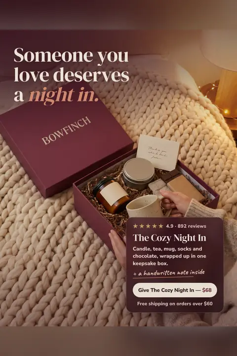 Burgundy and cream Bowfinch ad: 'Someone you love deserves a night in.' over a photo of an open maroon gift box on a chunky knit blanket, holding a candle, mug, socks, chocolate and a note. A card shows 4.9, 892 reviews, $68 and a 'Give The Cozy Night In' button. Shown here in the 2:3 Pinterest size.