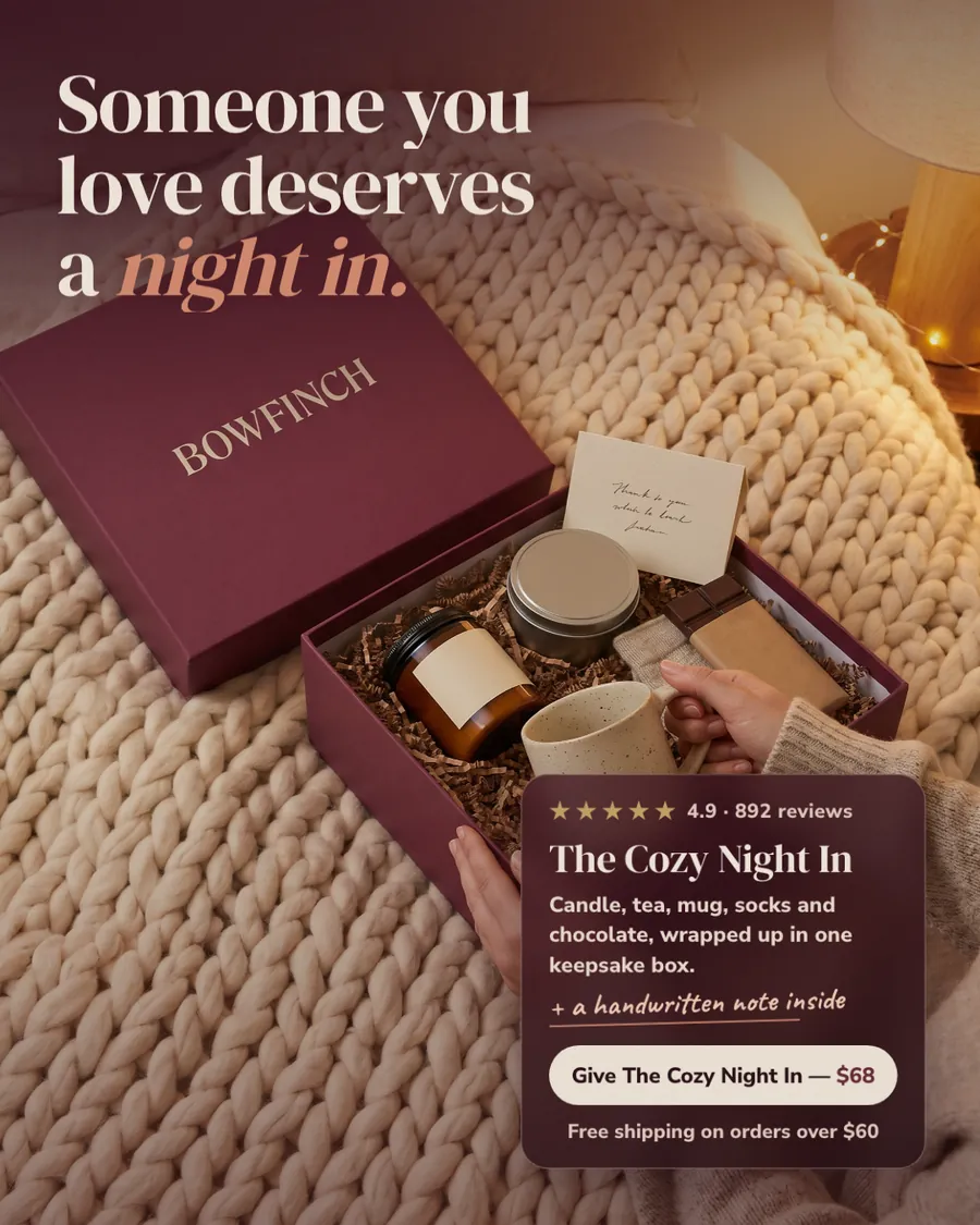 Burgundy and cream Bowfinch ad: 'Someone you love deserves a night in.' over a photo of an open maroon gift box on a chunky knit blanket, holding a candle, mug, socks, chocolate and a note. A card shows 4.9, 892 reviews, $68 and a 'Give The Cozy Night In' button.