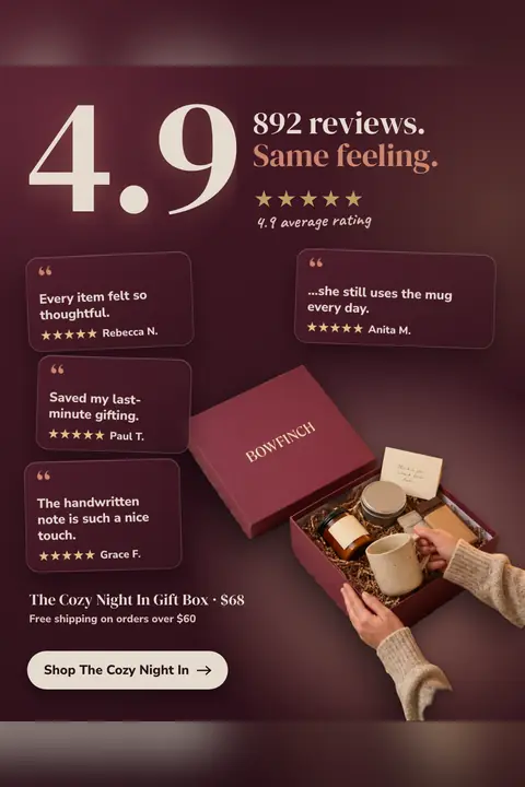 Deep burgundy Bowfinch ad: '892 reviews. Same feeling.' with a huge 4.9 and five gold stars, four quote cards from Rebecca N., Anita M., Paul T. and Grace F., an open gift box with a mug, candle and note, and a 'Shop The Cozy Night In' button. Shown here in the 2:3 Pinterest size.