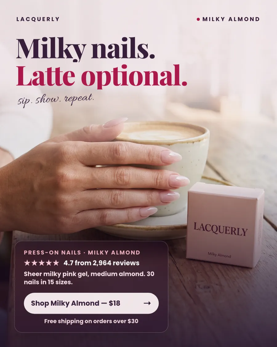 Soft blush and wood-tone Lacquerly ad: 'Milky nails. Latte optional.' A hand with pale pink almond nails rests on a latte cup beside a pink Milky Almond box, with 4.7 from 2,964 reviews and a 'Shop Milky Almond, $18' button.