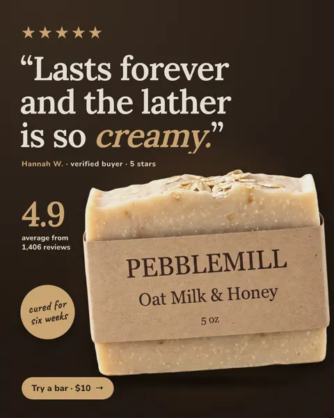 Dark brown Pebblemill Soap Co. ad: '“Lasts forever and the lather is so creamy.”' with five gold stars, a Hannah W. verified buyer credit, 4.9 average from 1,406 reviews, a 'cured for six weeks' badge, the oat soap bar in a kraft wrapper, and a 'Try a bar · $10' button. The 4:5 version.