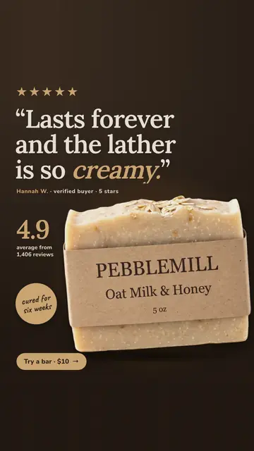 Dark brown Pebblemill Soap Co. ad: '“Lasts forever and the lather is so creamy.”' with five gold stars, a Hannah W. verified buyer credit, 4.9 average from 1,406 reviews, a 'cured for six weeks' badge, the oat soap bar in a kraft wrapper, and a 'Try a bar · $10' button. The 9:16 version.