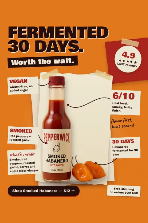 Orange Pepperwick ad: 'FERMENTED 30 DAYS. Worth the wait.' with a Smoked Habanero hot sauce bottle and two habaneros on taped paper, labels for vegan, smoked, 6/10 heat and 30 days, 4.9 from 1,537 reviews, and a $12 shop button. Shown here in the 2:3 Pinterest size.
