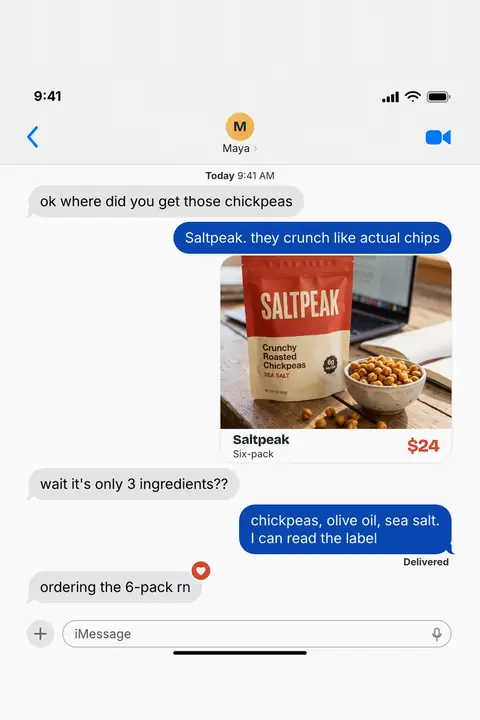 Light gray iMessage-style Saltpeak ad: 'ok where did you get those chickpeas' from a friend, answered 'Saltpeak. they crunch like actual chips' with a product photo card of a red bag and bowl of chickpeas, Six-pack $24, then a reply 'ordering the 6-pack rn'. Shown here in the 2:3 Pinterest size.