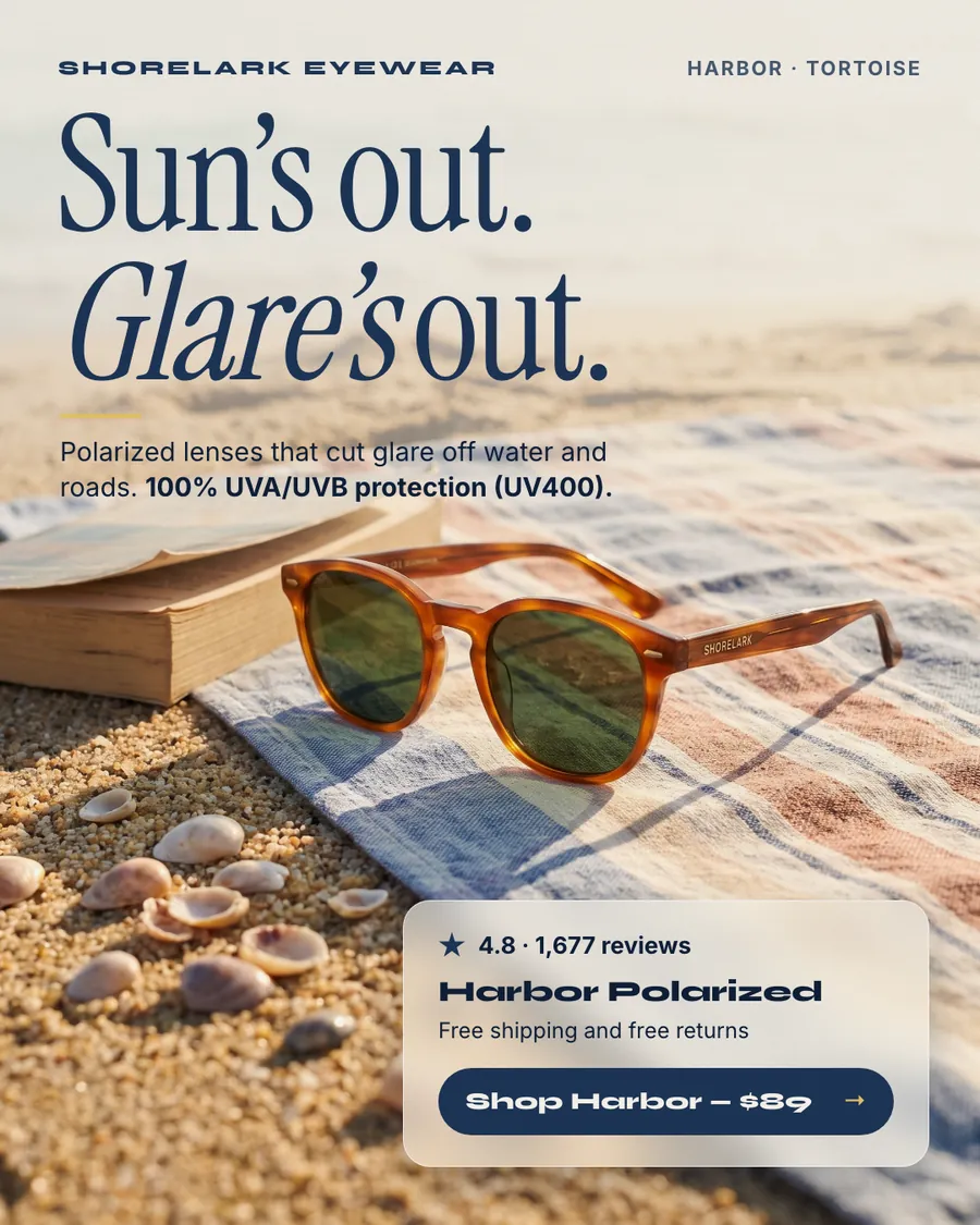 Sandy beige beach Shorelark Eyewear ad: 'Sun's out. Glare's out.' above tortoise Harbor sunglasses with green lenses resting on a striped towel beside a book and shells, with 4.8 from 1,677 reviews, free shipping and returns, and a 'Shop Harbor - $89' button.